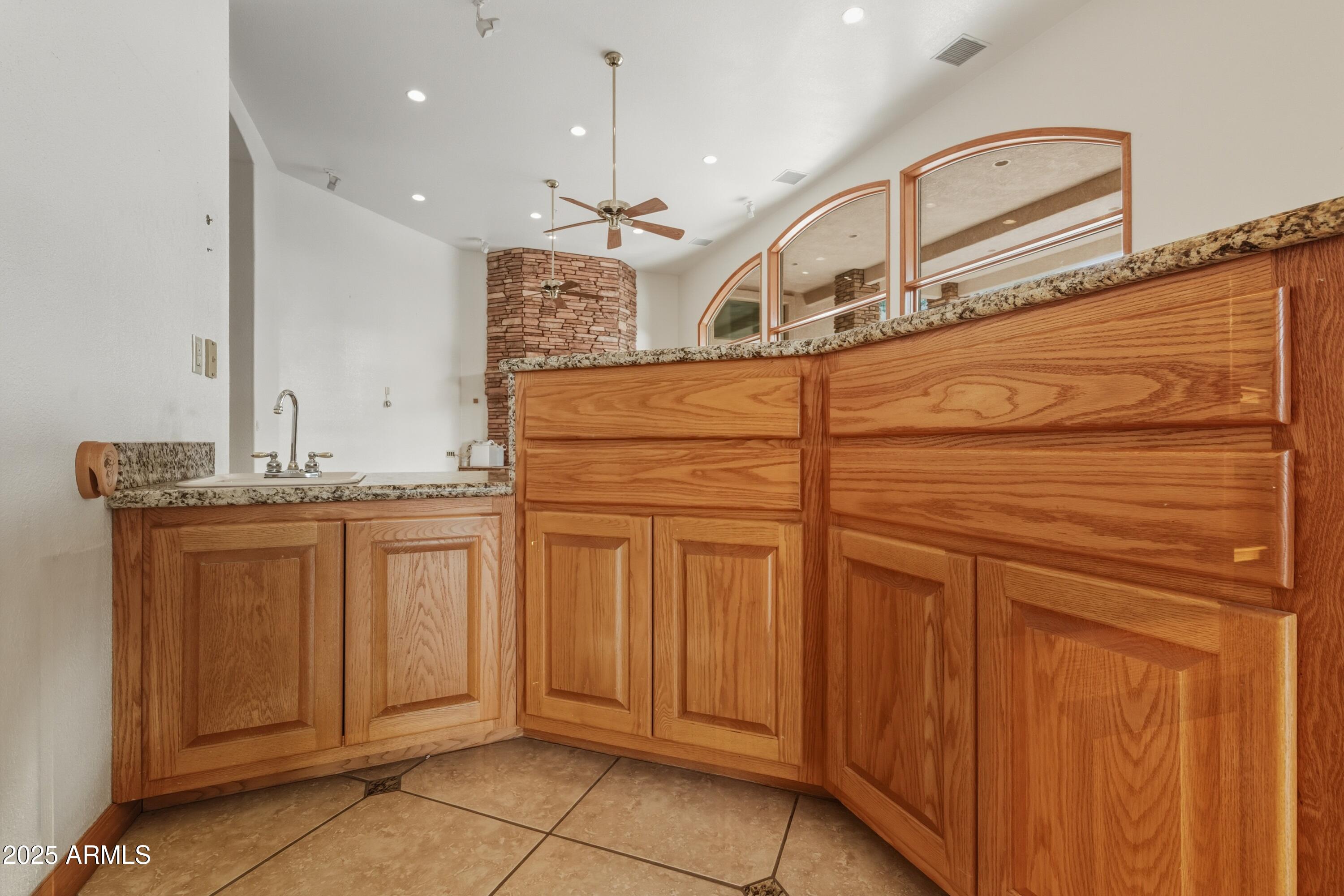 1606 Becky Circle Payson, AZ 85541 - Photo 14 of 58 a bathroom with a sink and a mirror