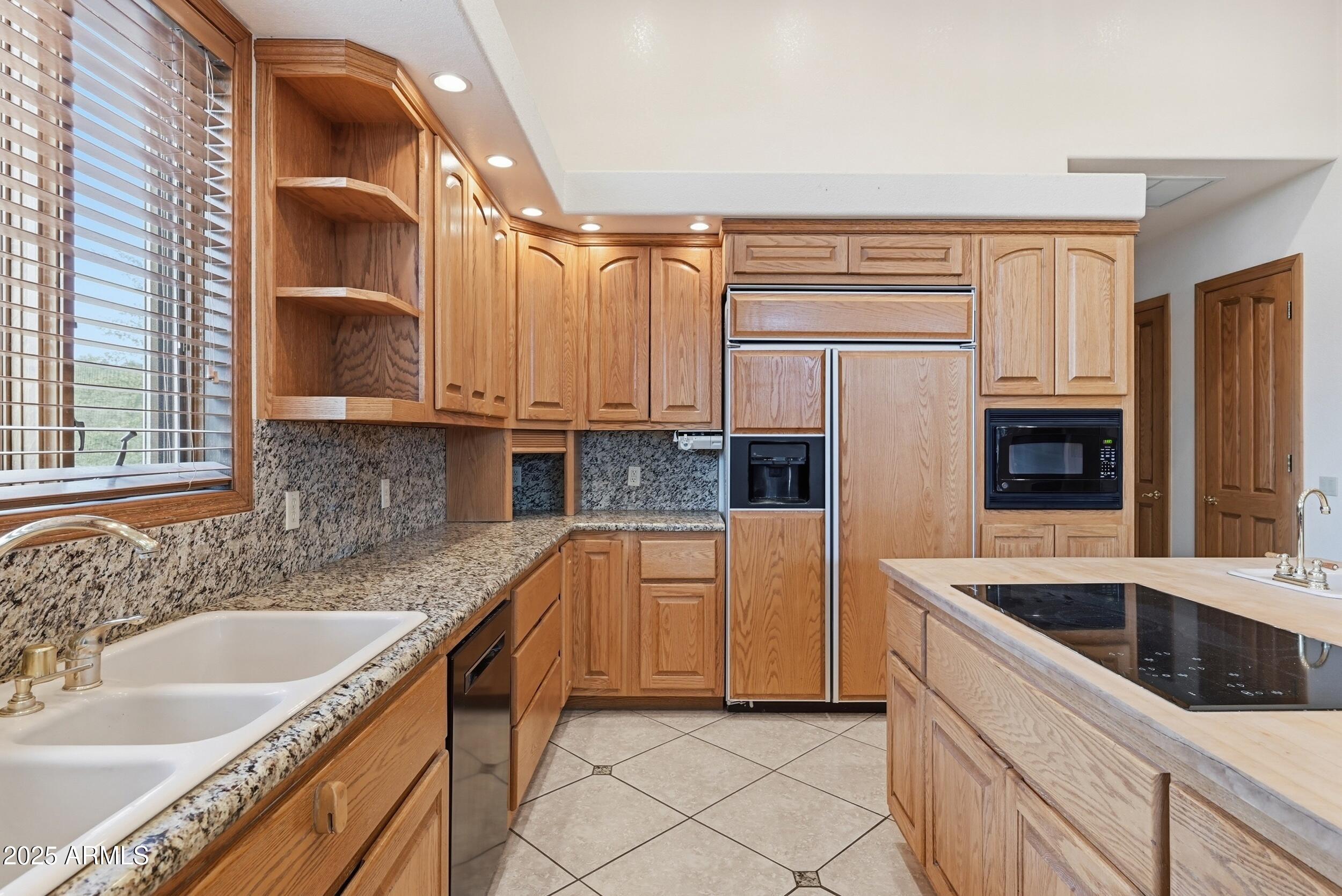 1606 Becky Circle Payson, AZ 85541 - Photo 22 of 58 a kitchen with white cabinets and white appliances