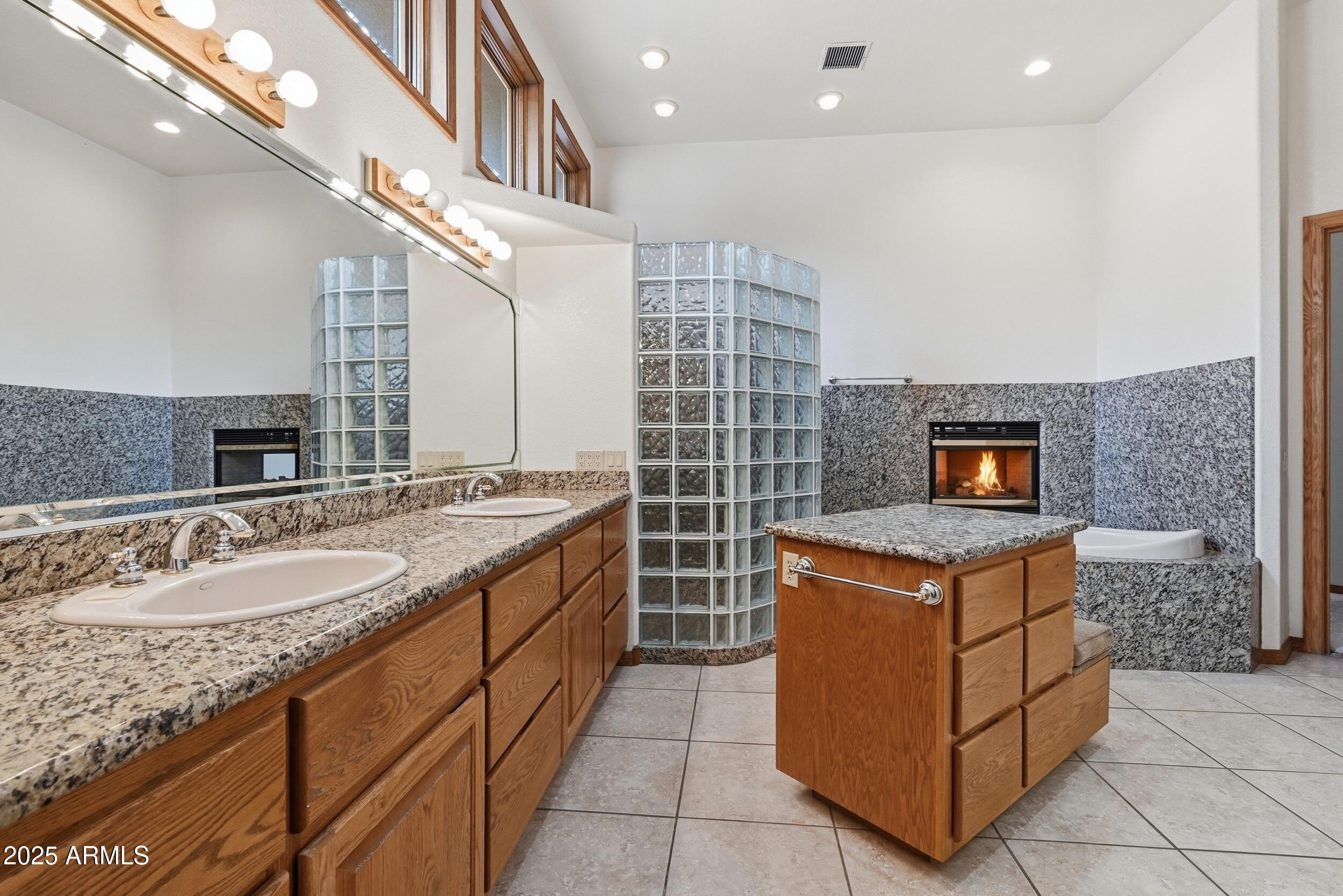1606 Becky Circle Payson, AZ 85541 - Photo 36 of 58 a kitchen with a sink stove and cabinets