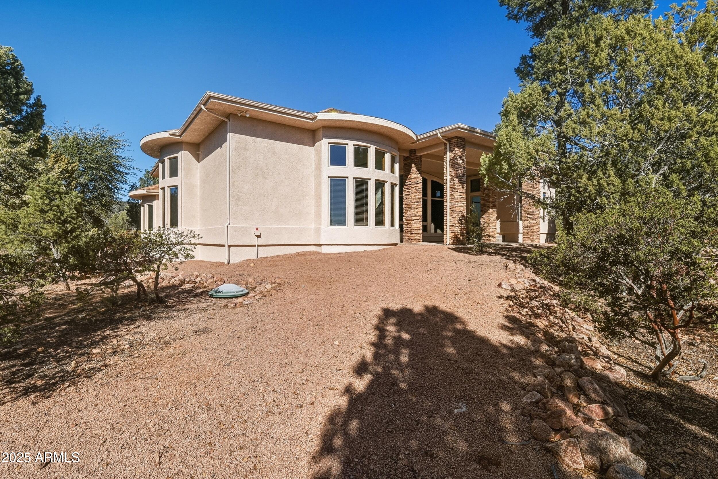 1606 Becky Circle Payson, AZ 85541 - Photo 47 of 58 a front view of a house with a yard