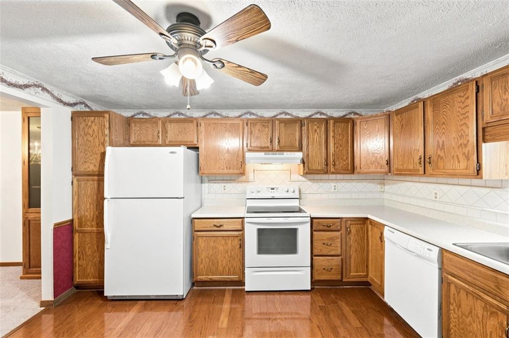 Equipped kitchen with ample counter space.