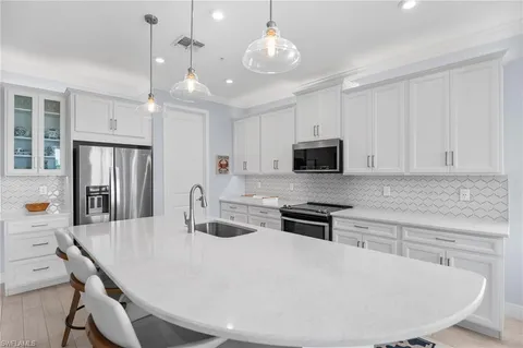 $585,000 | 4620 Arboretum Circle, Unit 201, Naples, FL 34112