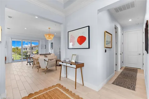 $585,000 | 4620 Arboretum Circle, Unit 201, Naples, FL 34112