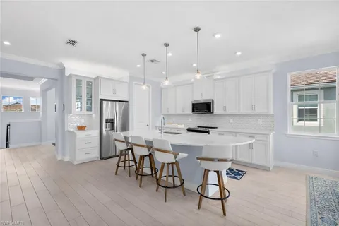 $585,000 | 4620 Arboretum Circle, Unit 201, Naples, FL 34112