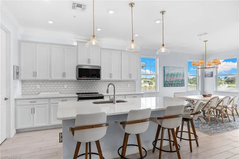 $585,000 | 4620 Arboretum Circle, Unit 201, Naples, FL 34112