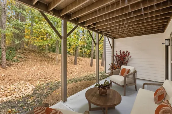 a front view of a building with a window and a ceiling fan