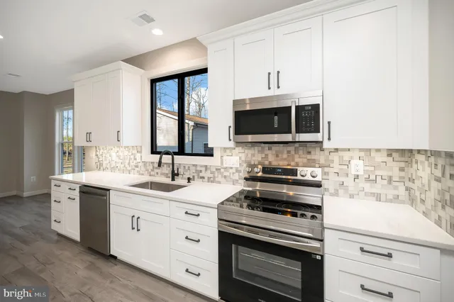 a view of wooden floor in an empty room