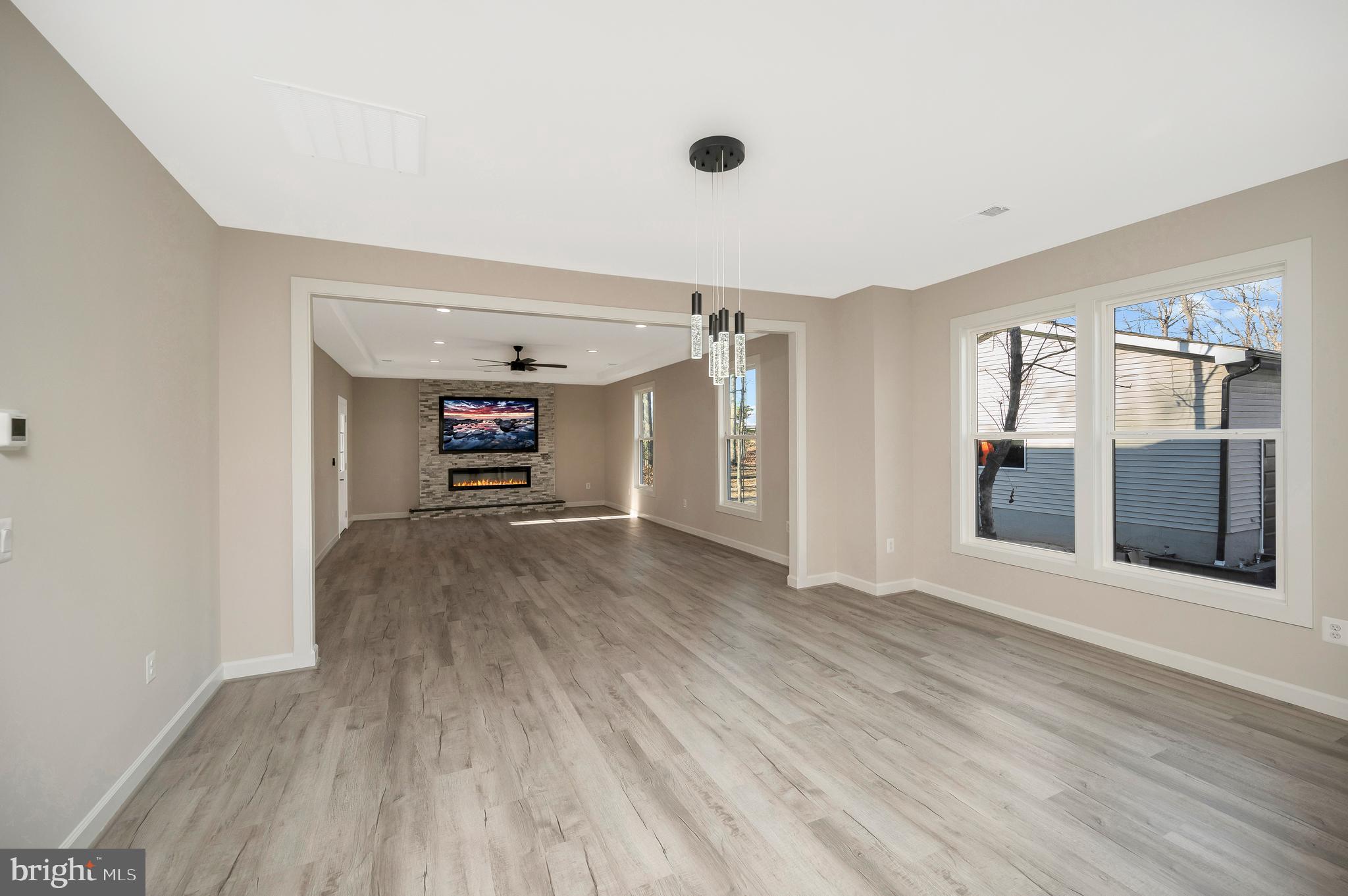 430 Liberty Boulevard Locust Grove, VA 22508 - Photo 27 of 66 a view of a empty room with wooden floor and a window