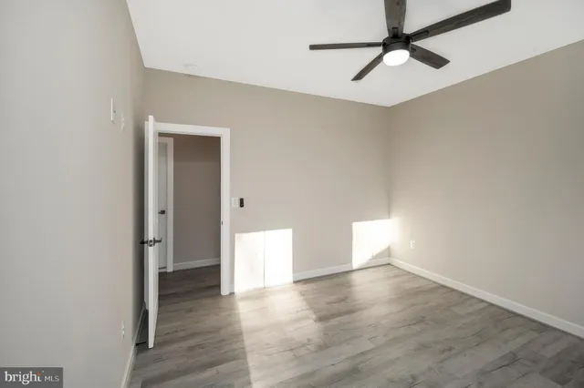 a view of a lake with houses in the background