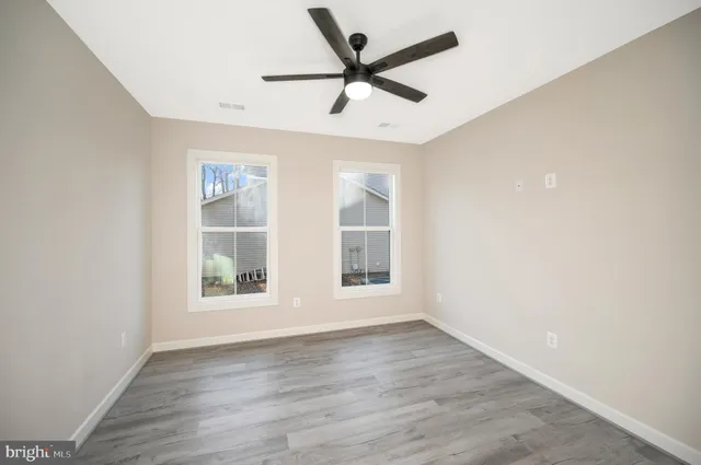 a view of a golf course with a lake