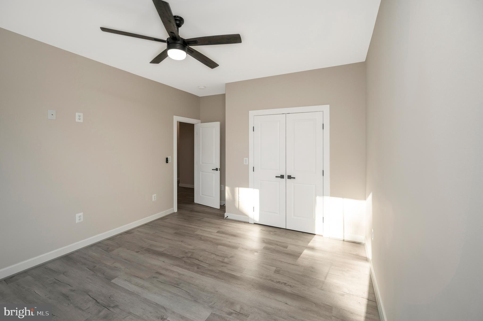430 Liberty Boulevard Locust Grove, VA 22508 - Photo 48 of 66 wooden floor in an empty room with a window