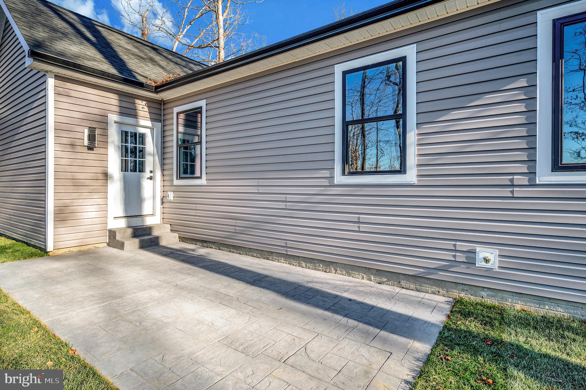 430 Liberty Boulevard Locust Grove, VA 22508 - Photo 8 of 66 a view of a house with a yard and sitting area