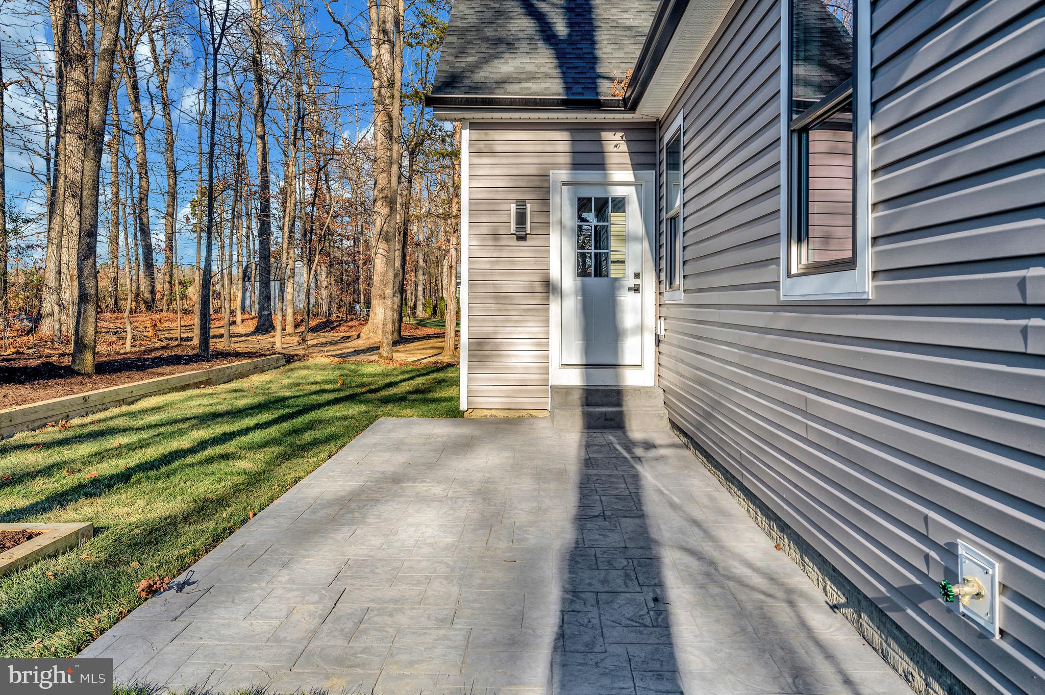 430 Liberty Boulevard Locust Grove, VA 22508 - Photo 9 of 66 a view of a pathway of a house with a yard