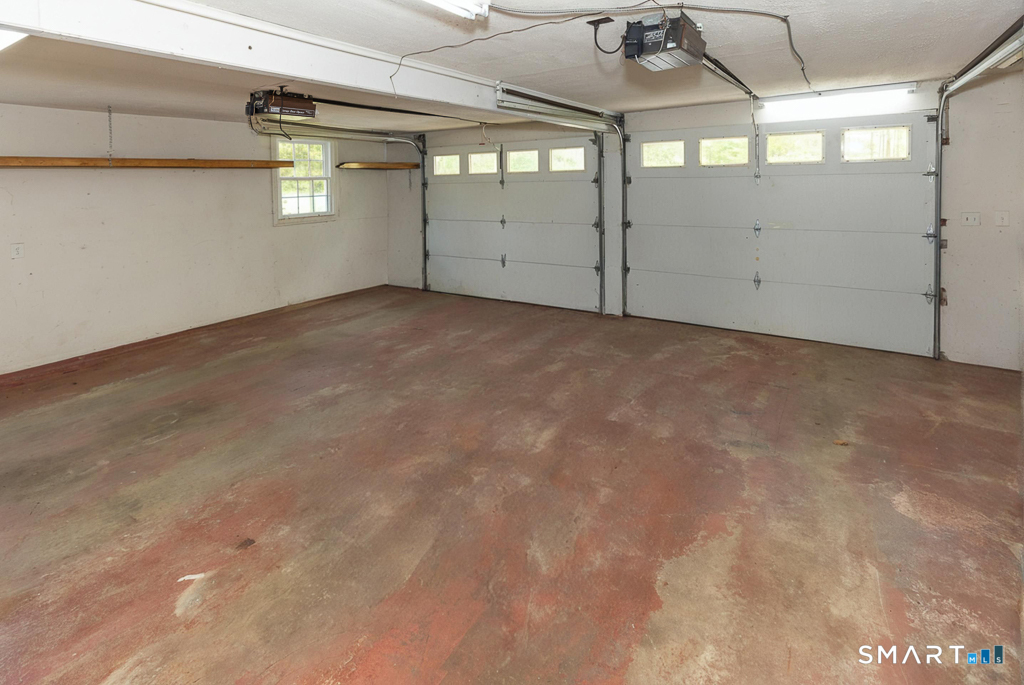 49 Kelseytown Road Clinton, CT 06413 - Photo 32 of 40 There is a spacious two bay garage with walkup attic space - storage or more workshop space!
