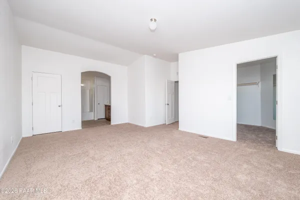 an empty room with an entryway