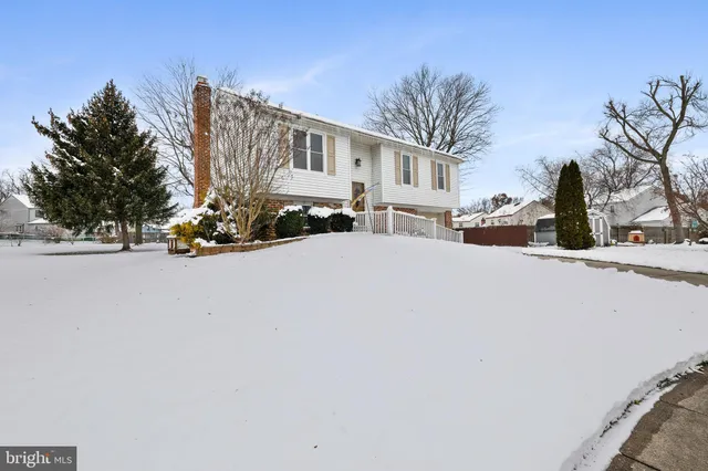 a view of a street with a building in the background