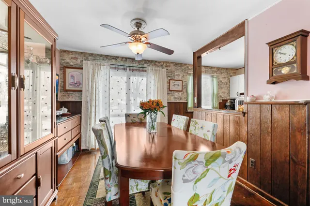 a kitchen with granite countertop a stove and a refrigerator