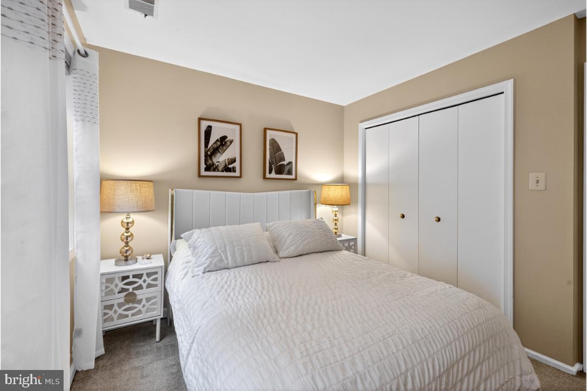 7347 Swan Point Way, Unit 122 Columbia, MD 21045 - Photo 32 of 54 a bedroom with a bed and a window