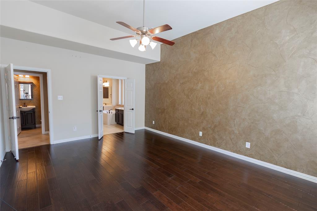 2931 Bandera Grand Prairie, TX 75054 - Photo 19 of 34 a view of an empty room with wooden floor