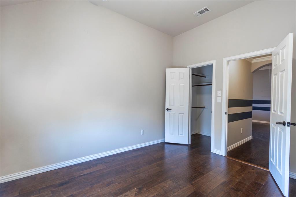 2931 Bandera Grand Prairie, TX 75054 - Photo 31 of 34 a view of empty room with wooden floor