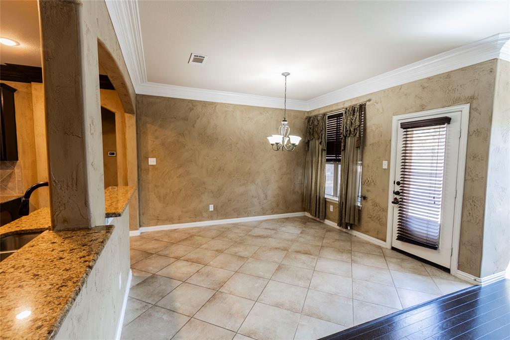 2931 Bandera Grand Prairie, TX 75054 - Photo 9 of 34 a view of a hallway with wooden floor and a bathroom