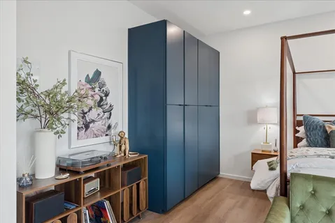 a view of a bedroom with workspace