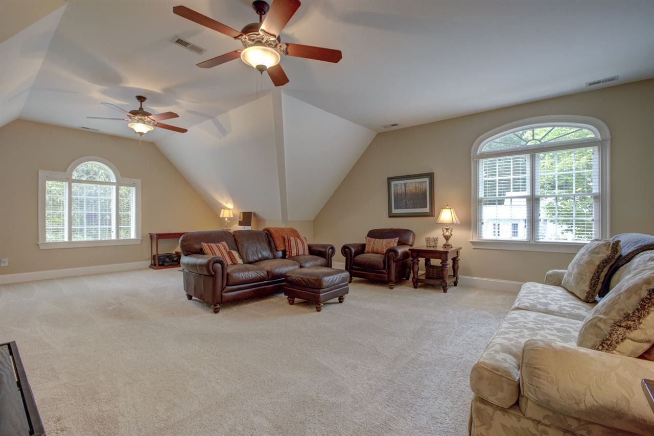 1009 Quiet Ridge Circle Raleigh, NC 27614 - Photo 22 of 30 Huge Bonus Room with Separate Back Entry Stair. Additional unfinished storage areas Bonus Room