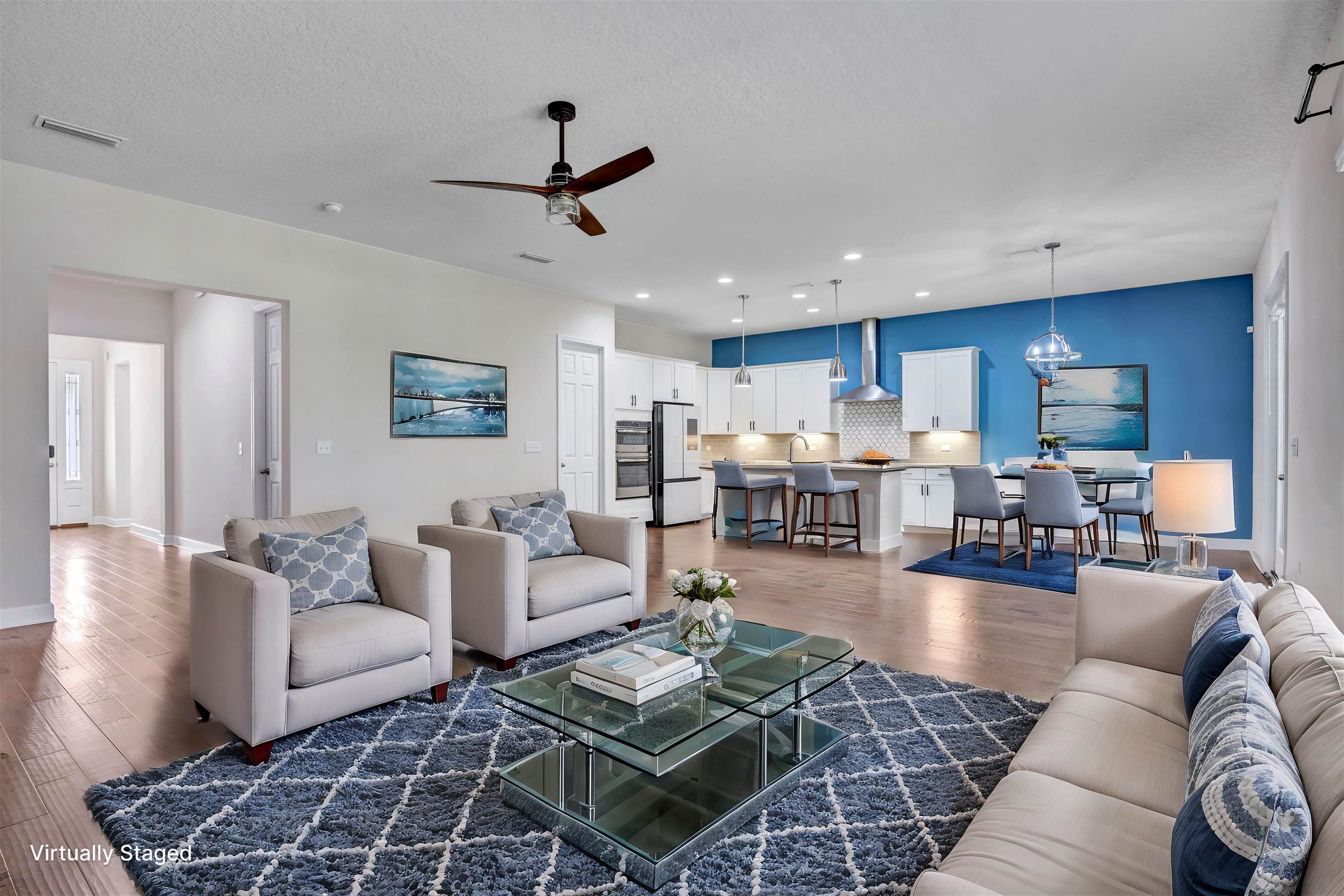 267 Downs Corner Road St. Augustine, FL 32092 - Photo 12 of 37 a living room with furniture and kitchen view