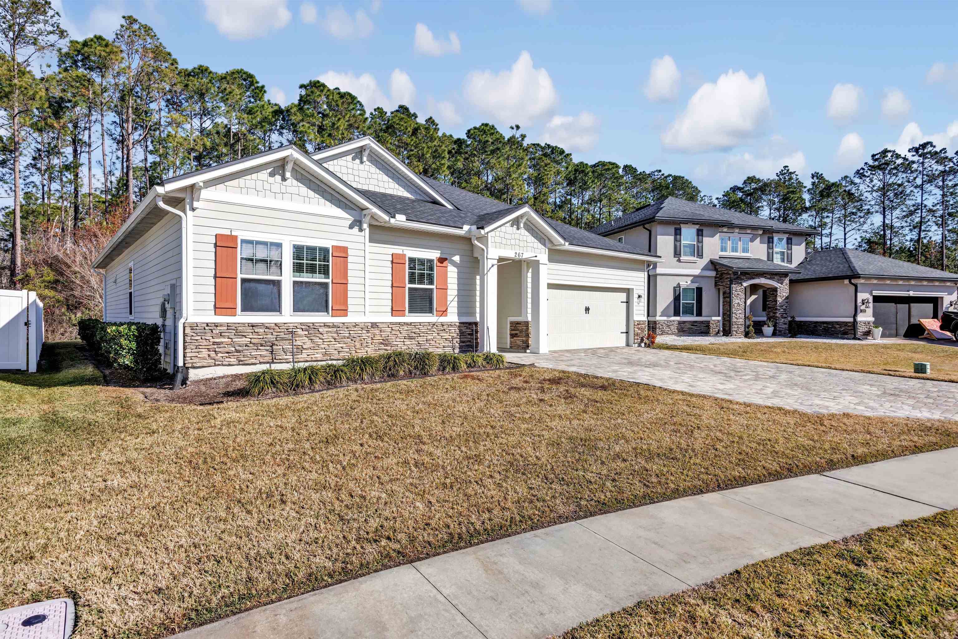 267 Downs Corner Road St. Augustine, FL 32092 - Photo 2 of 37 front view of a house with a yard