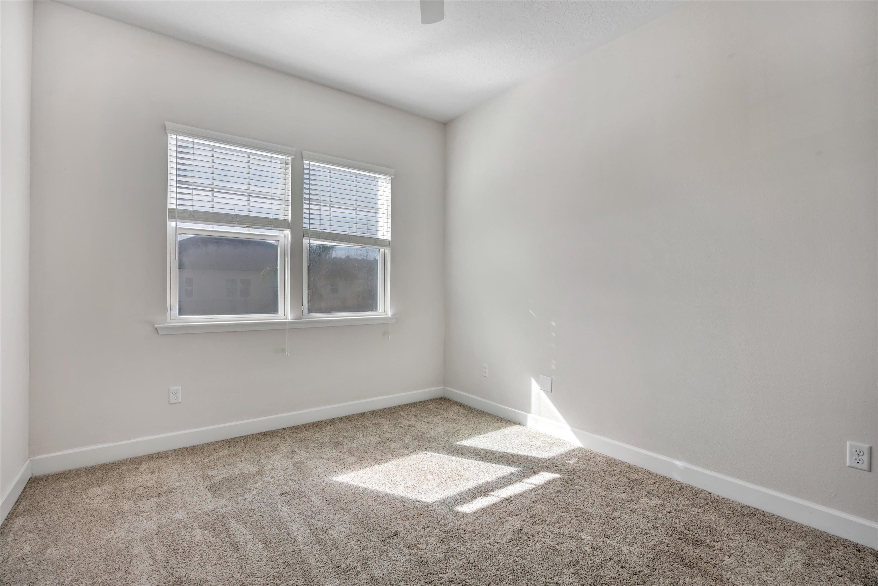 267 Downs Corner Road St. Augustine, FL 32092 - Photo 24 of 37 an empty room with a window