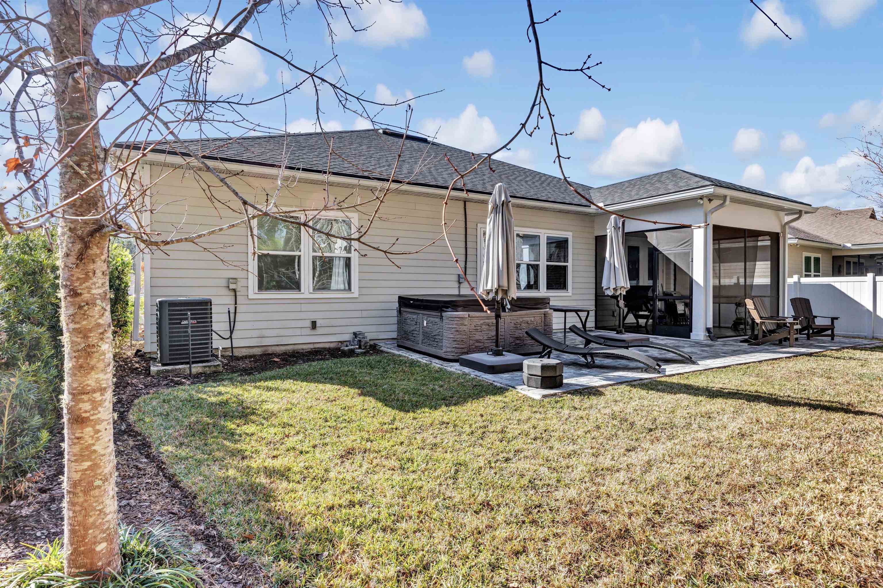 267 Downs Corner Road St. Augustine, FL 32092 - Photo 34 of 37 a view of a house with swimming pool and sitting area