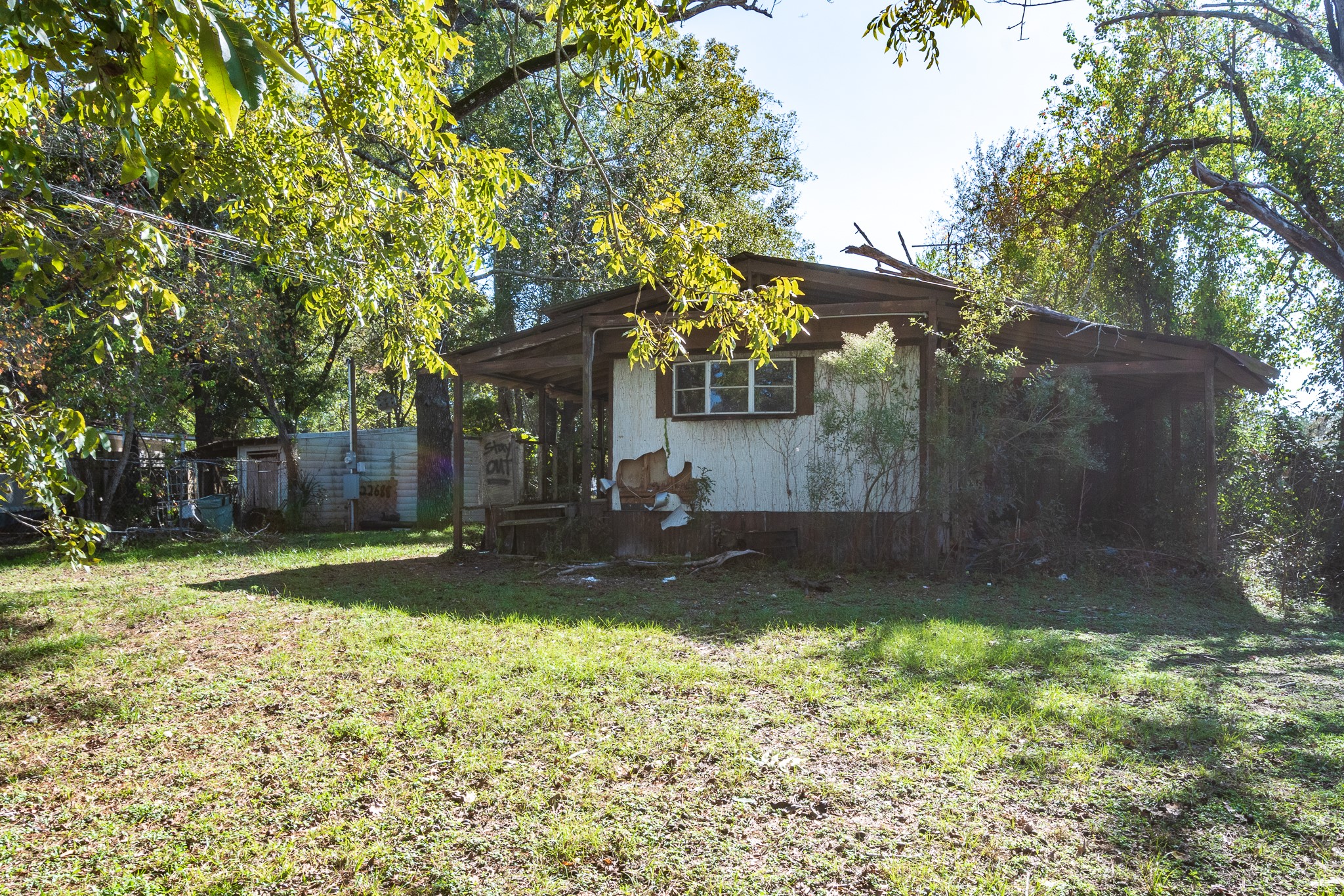 22688 Oakley Road New Caney, TX 77357 - Photo 11 of 11 a backyard of a house with table and chairs
