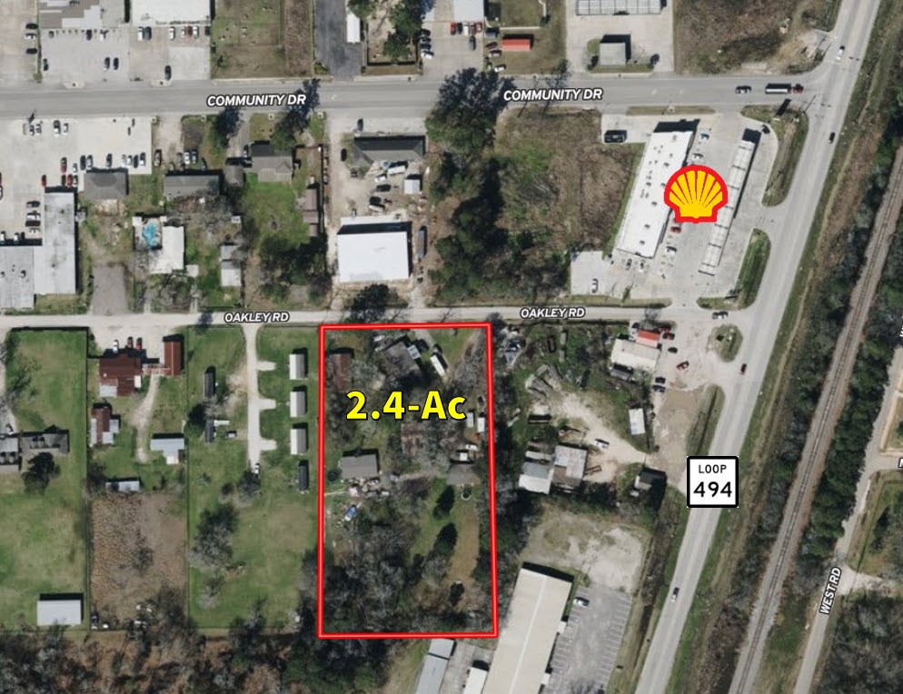 22688 Oakley Road New Caney, TX 77357 - Photo 3 of 11 an aerial view of houses and outdoor space