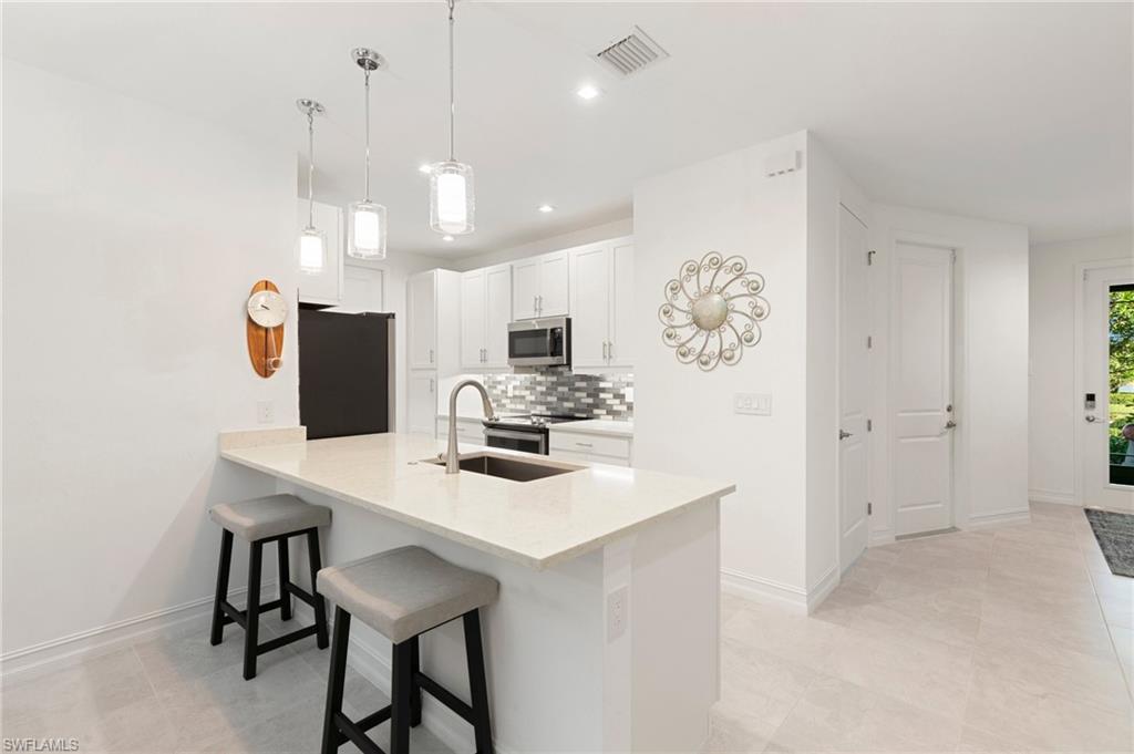 7328 Rockefeller Drive Naples, FL 34119 - Photo 7 of 41 Gallery Image 7