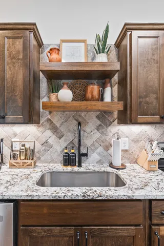 a bathroom with a toilet a sink and a mirror