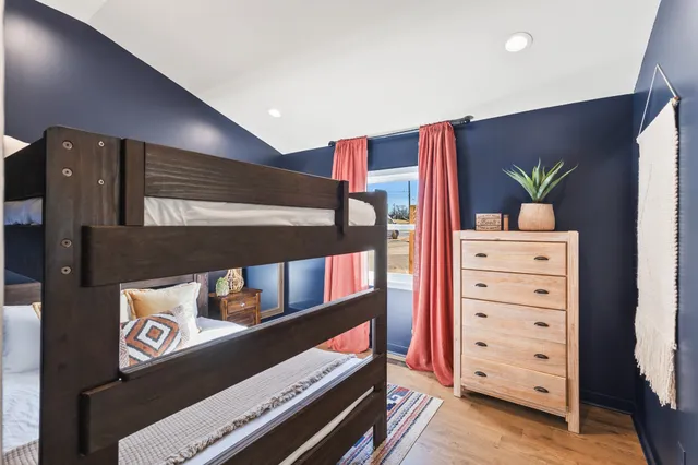 a kitchen with stainless steel appliances a stove microwave and refrigerator