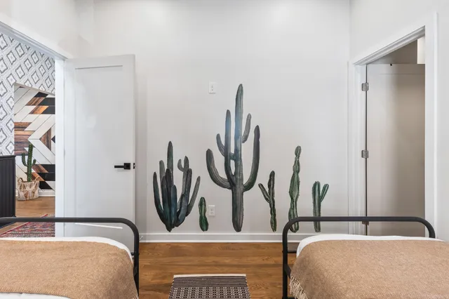 a kitchen with stainless steel appliances granite countertop a sink a stove top oven a counter space and cabinets