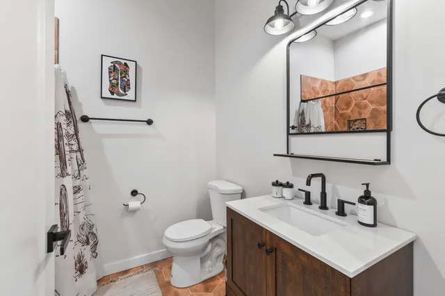 a kitchen with a sink and a window