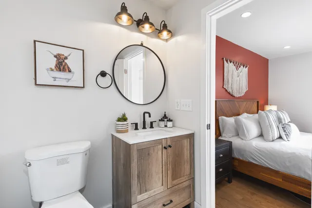 a kitchen with a sink stove and refrigerator