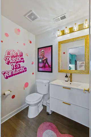 a bed room with a bed window and a potted plant