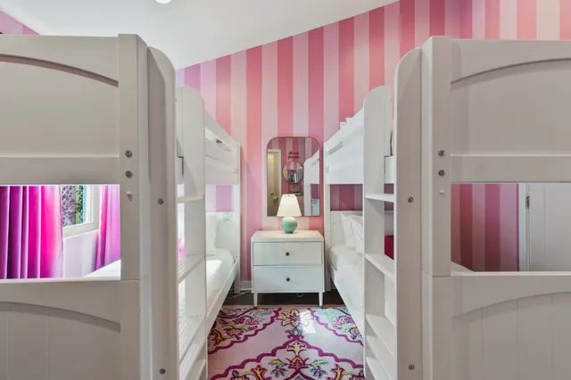 a bathroom with a sink mirror vanity and toilet