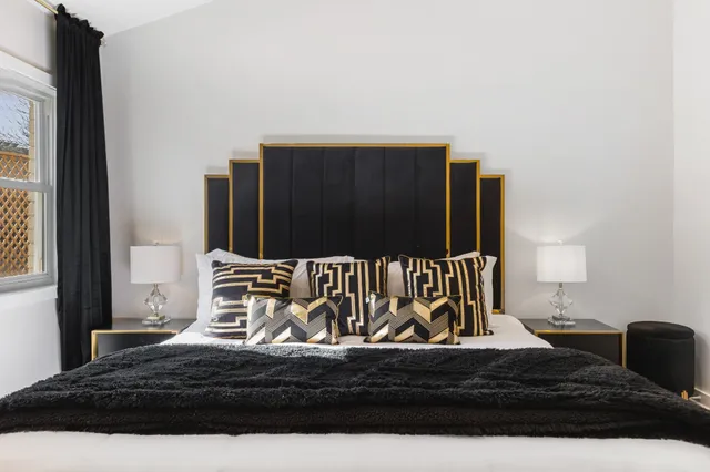 a bathroom with a bathtub and a shower curtain