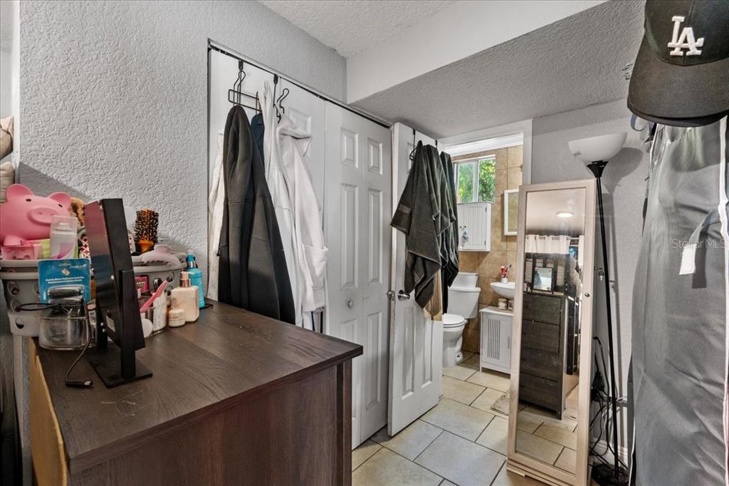 812 West Bryan Street Kissimmee, FL 34741 - Photo 14 of 27 a view of a kitchen with refrigerator and workspace