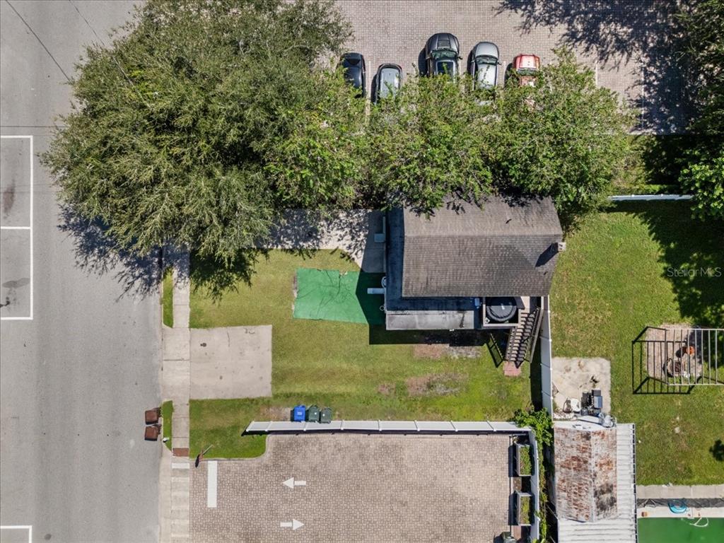 812 West Bryan Street Kissimmee, FL 34741 - Photo 16 of 27 an aerial view of a house with garden space and lake view