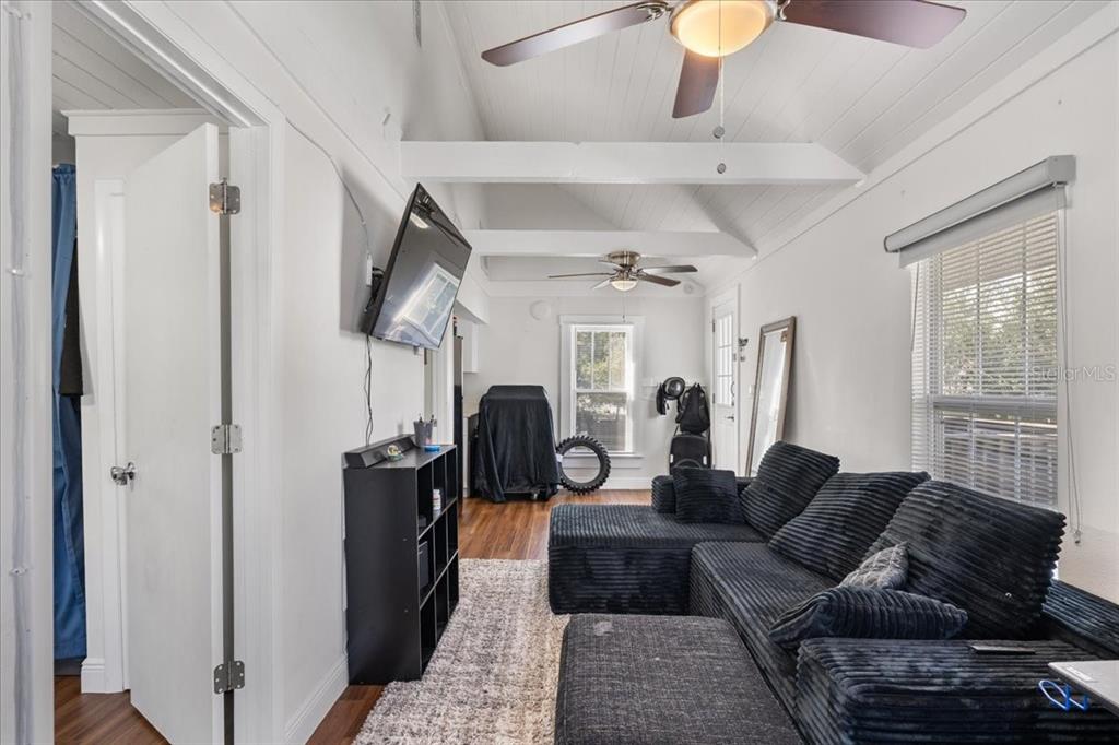 812 West Bryan Street Kissimmee, FL 34741 - Photo 21 of 27 a living room with furniture and a window