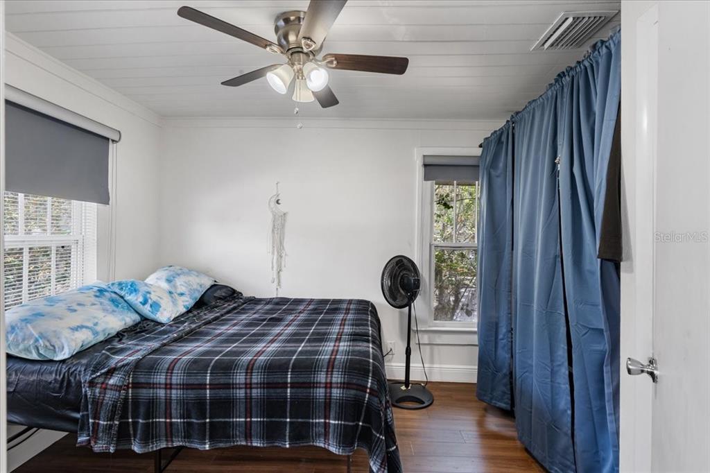 812 West Bryan Street Kissimmee, FL 34741 - Photo 22 of 27 a bedroom with a bed and a window