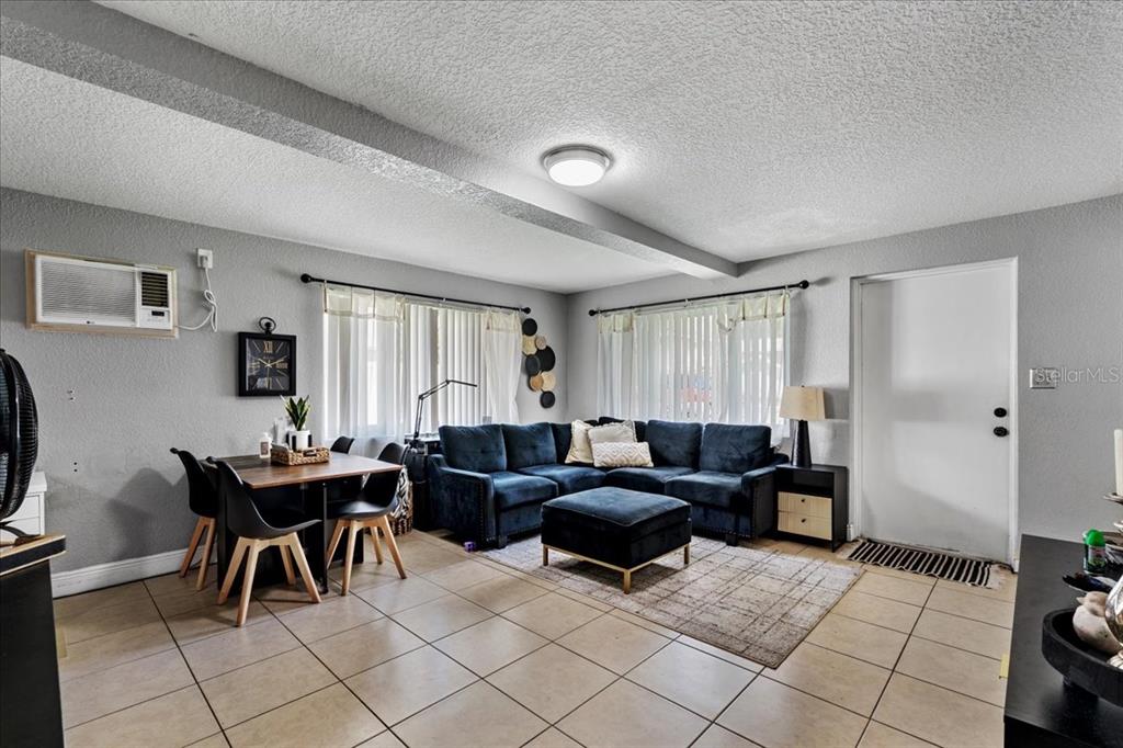 812 West Bryan Street Kissimmee, FL 34741 - Photo 5 of 27 a living room with furniture and a window