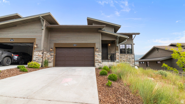 355 East Overlook Loop Hideout, UT 84036 - Photo 40 of 40 Contemporary exterior featuring horizontal siding and stone accents