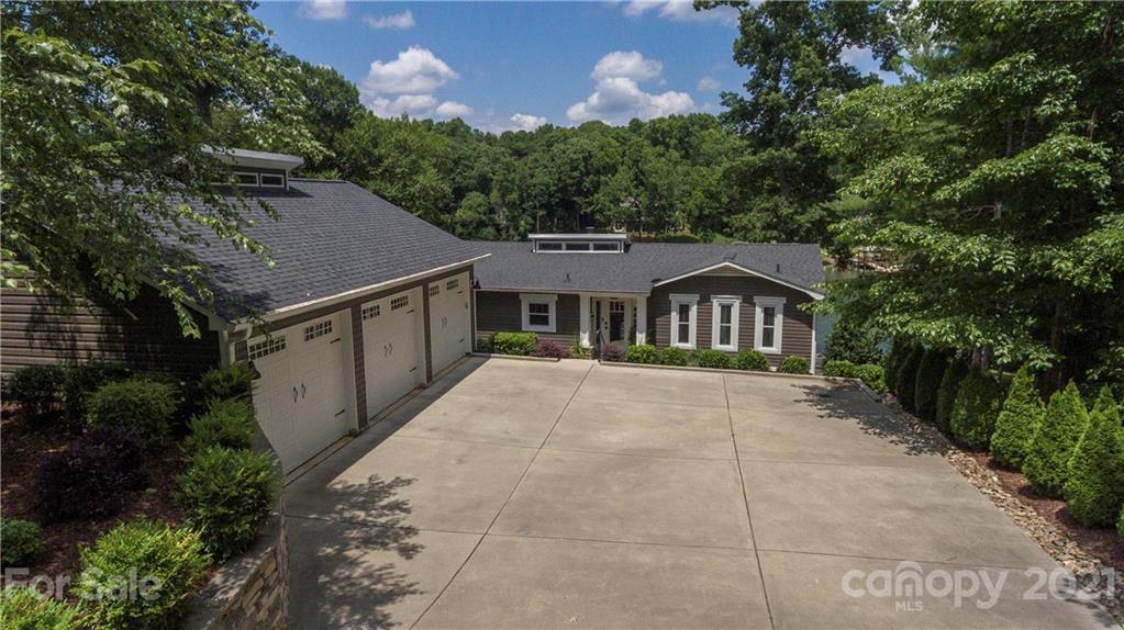 148 Lakeland Road Mooresville, NC 28117 - Photo 1 of 48 a house with outdoor space