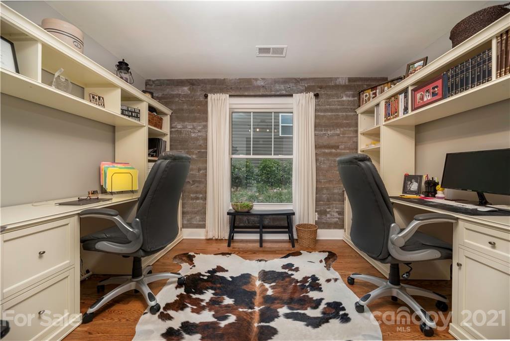 148 Lakeland Road Mooresville, NC 28117 - Photo 13 of 48 a view of a workspace with furniture and a window